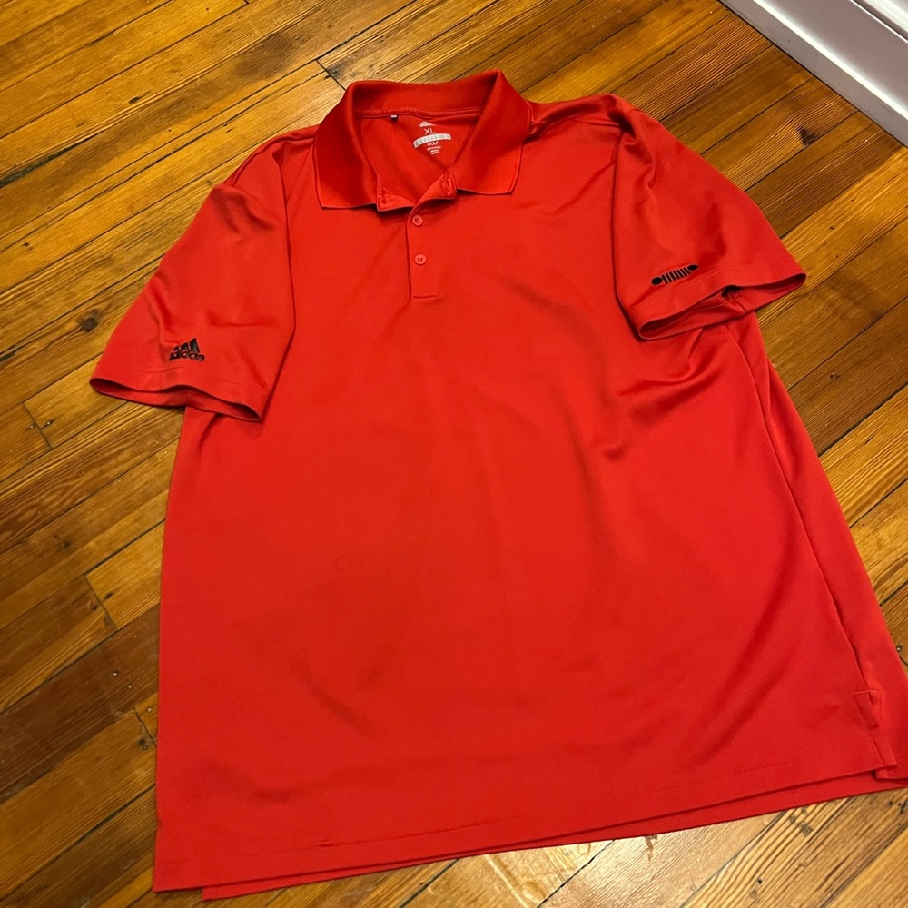 Adidas golf shirt with seven slot jeep logo on sleeve